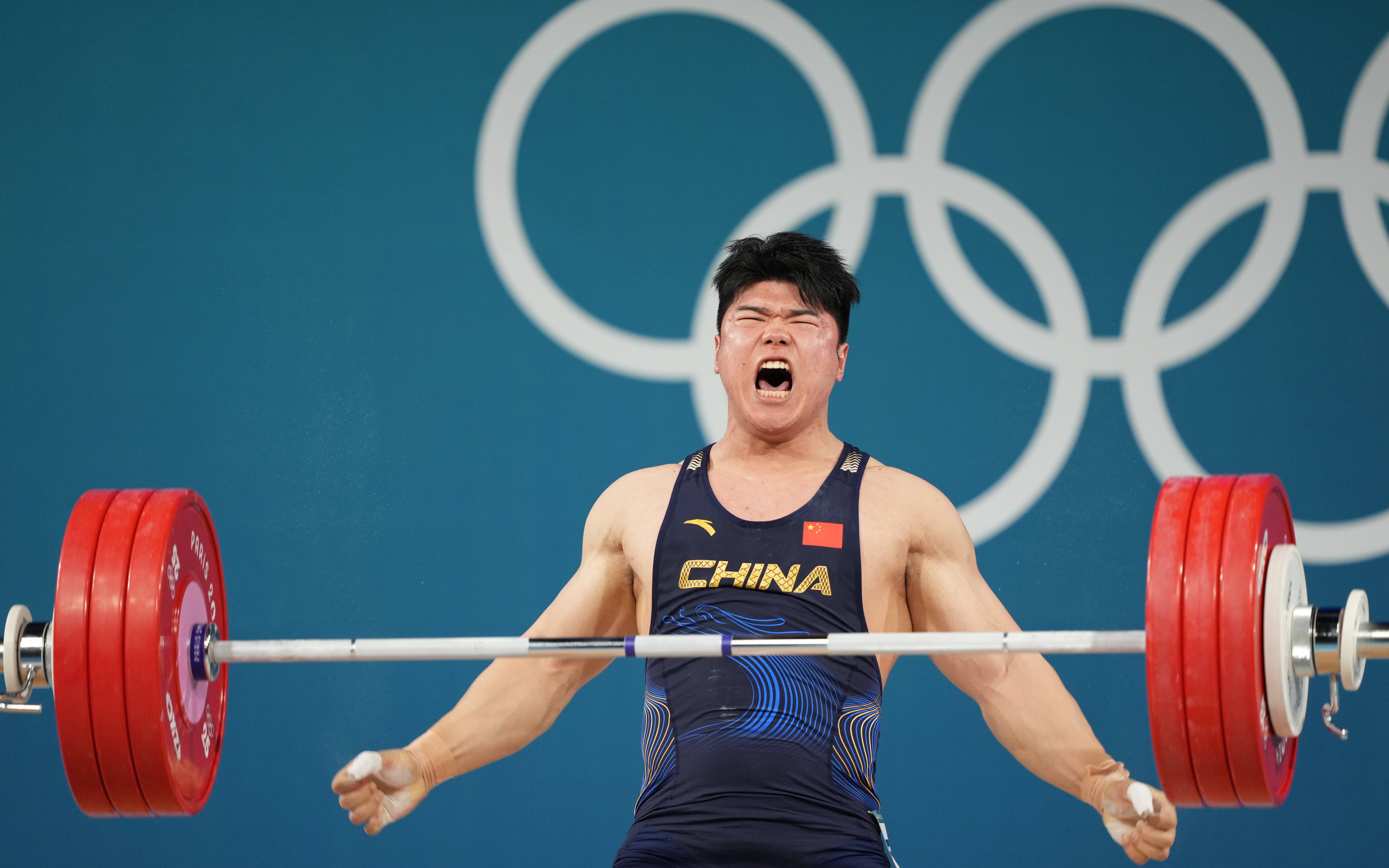 日本运动员突破纪录夺取举重项目冠军